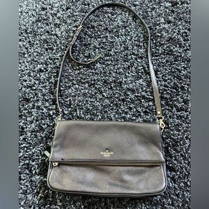 Kate Spade crossbody bag. Length: 13 inches Height: 8.5 inches Width: 1.5 in